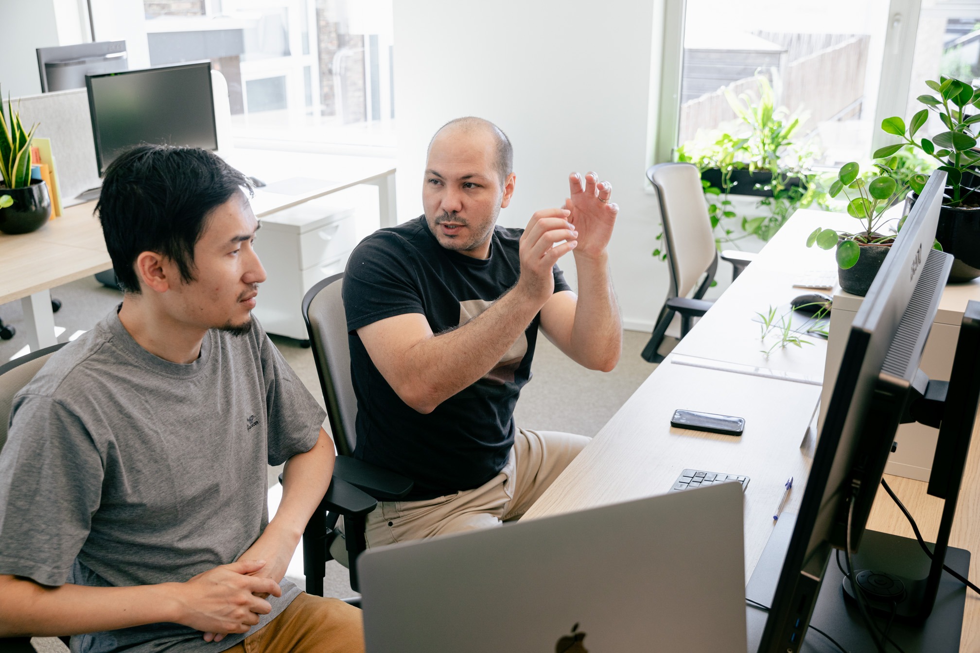 Karim and Wenzhu at work