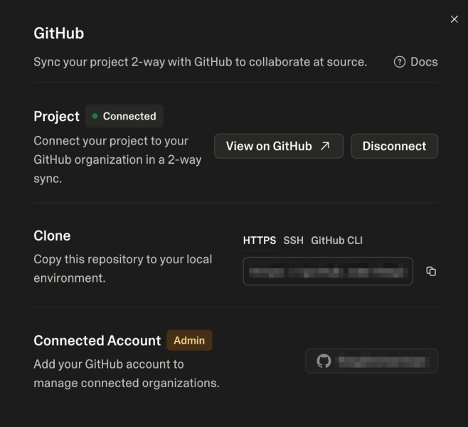 Screenshot of the GitHub connection settings inside Lovable, showing a project successfully synced in two-way mode with options to view on GitHub, clone via HTTPS or SSH, and manage connected accounts.