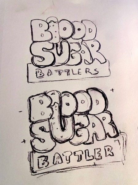 photo of real-life process sketches of Blood Sugar Battler Logo